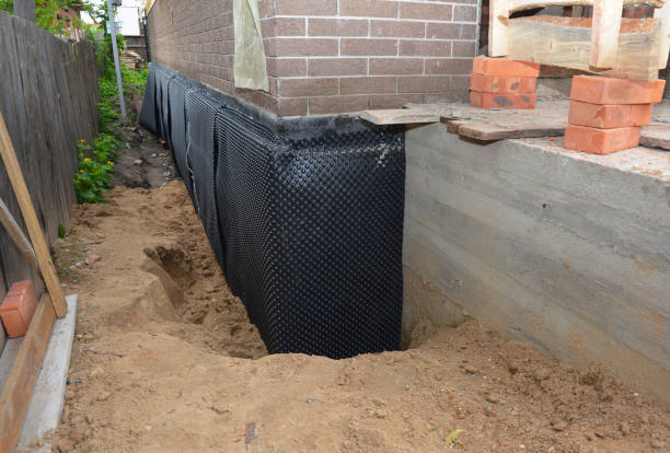 Happy homeowners after waterproofing job in Kingston Springs